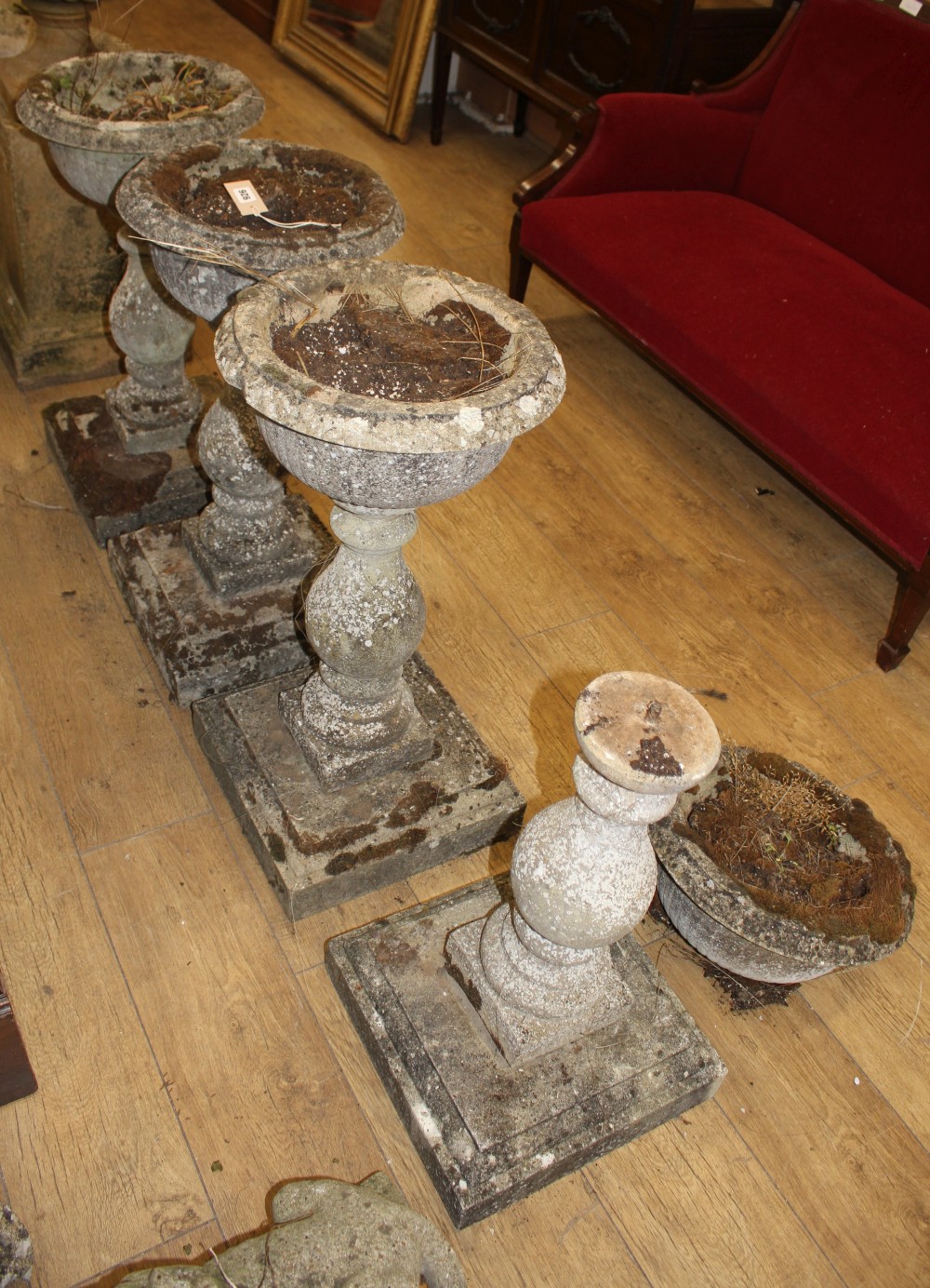 A set of four reconstituted stone pedestal garden urns, H.74cm, Diam.37cm